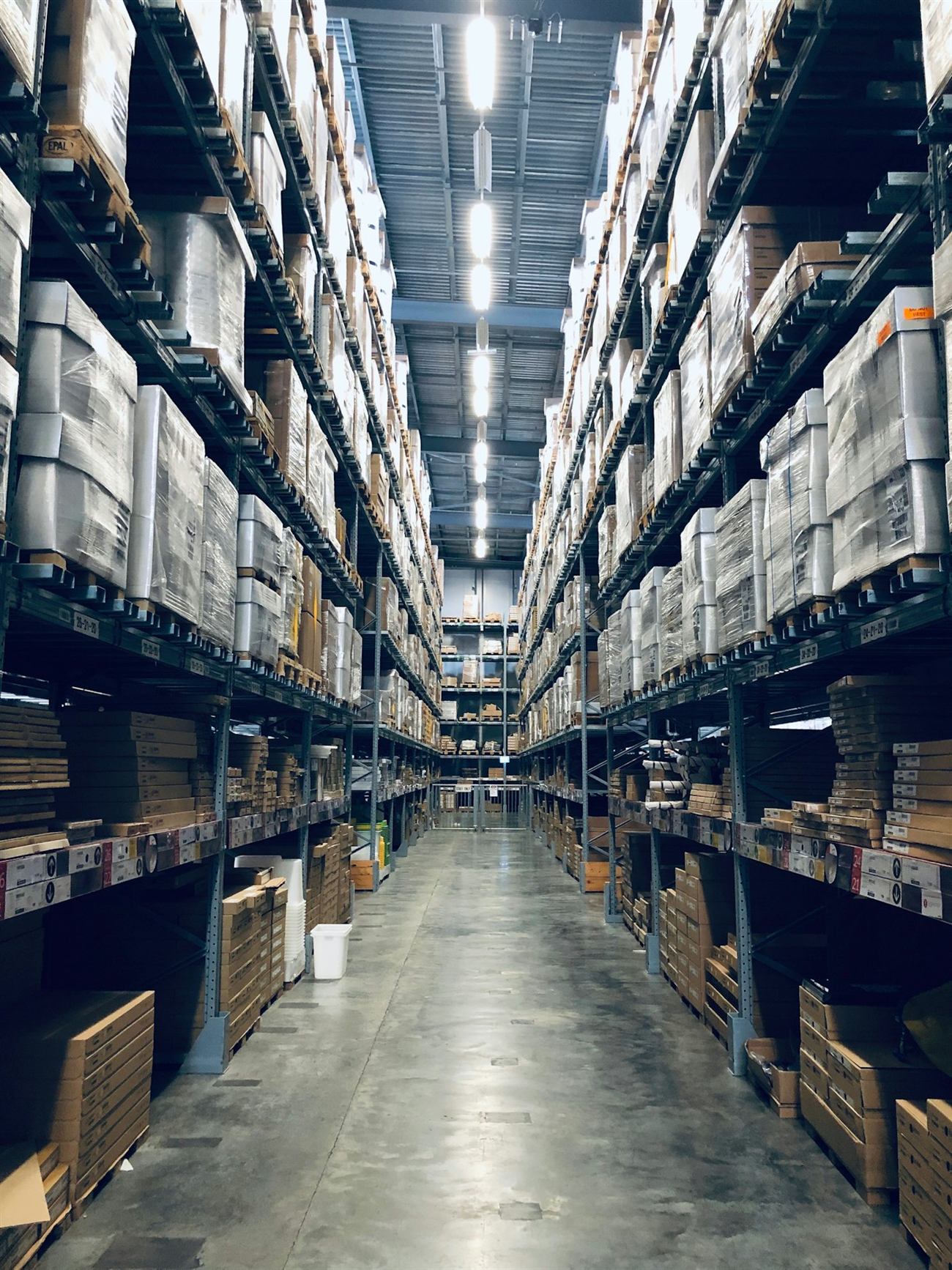 Warehouse aisles stacked with inventory